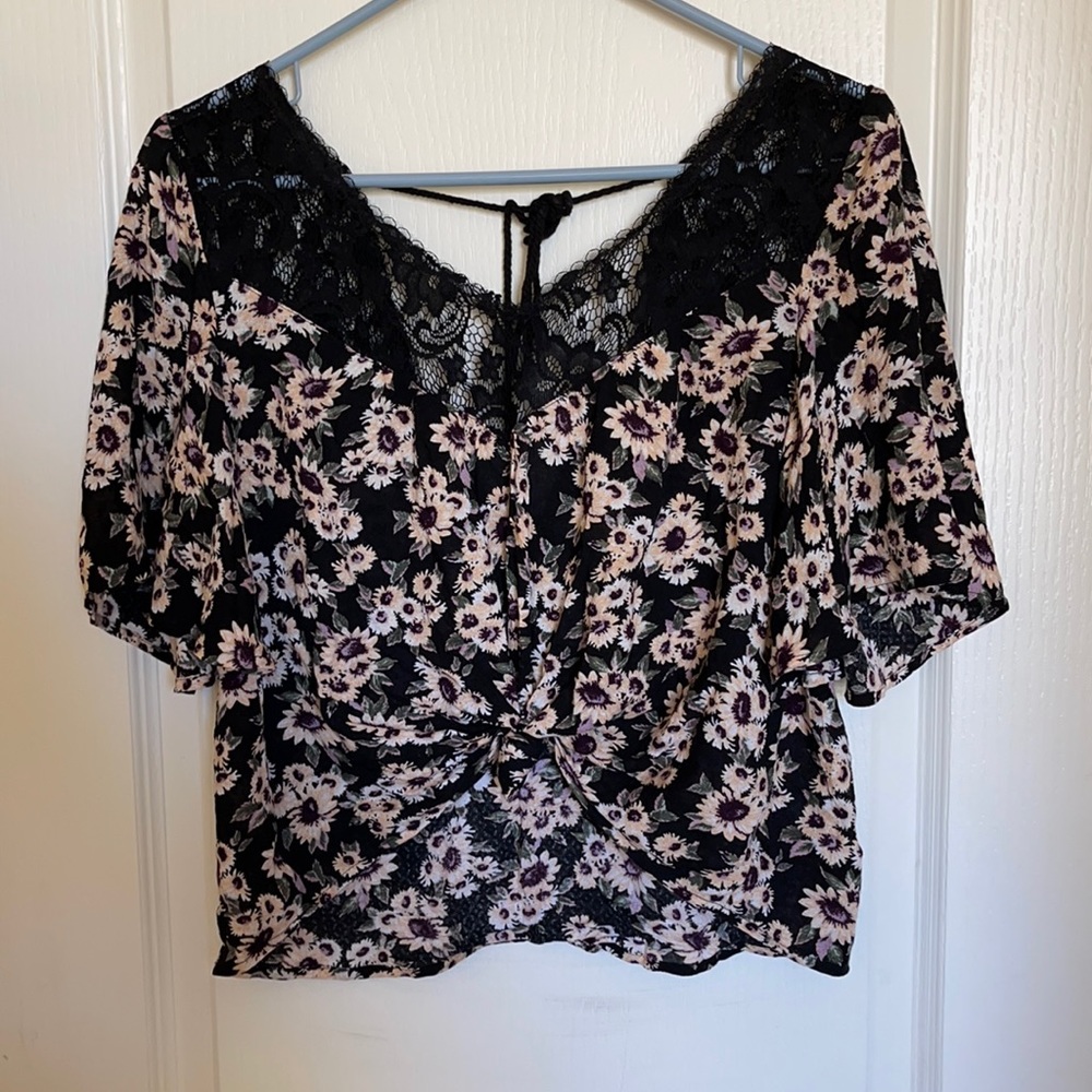 Floral blouse with lace detail on the neck line
